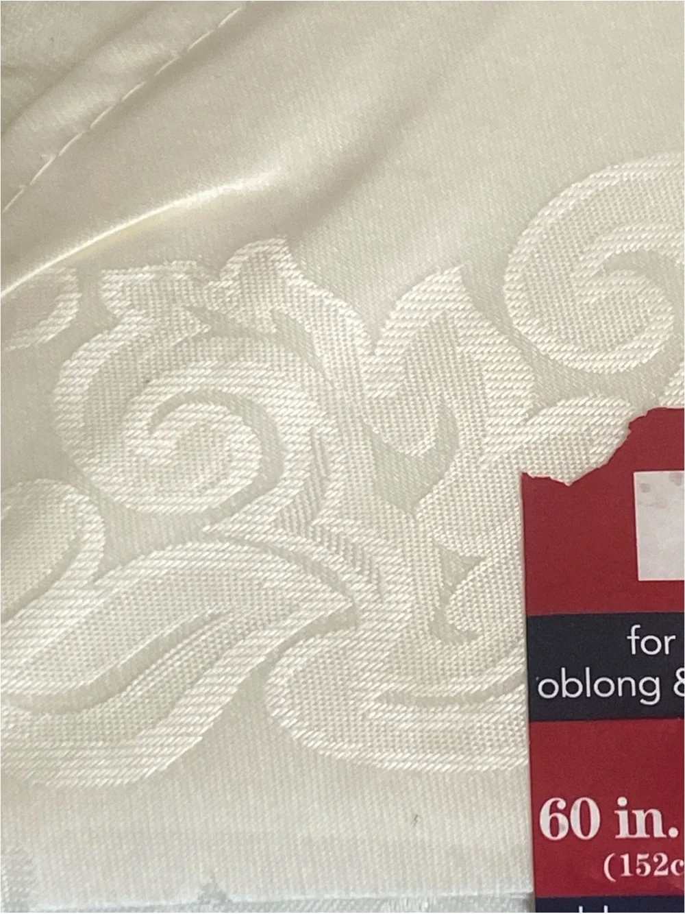 December Home satiny rectangular oblong tablecloth and 8 napkin set 60” x 102”.